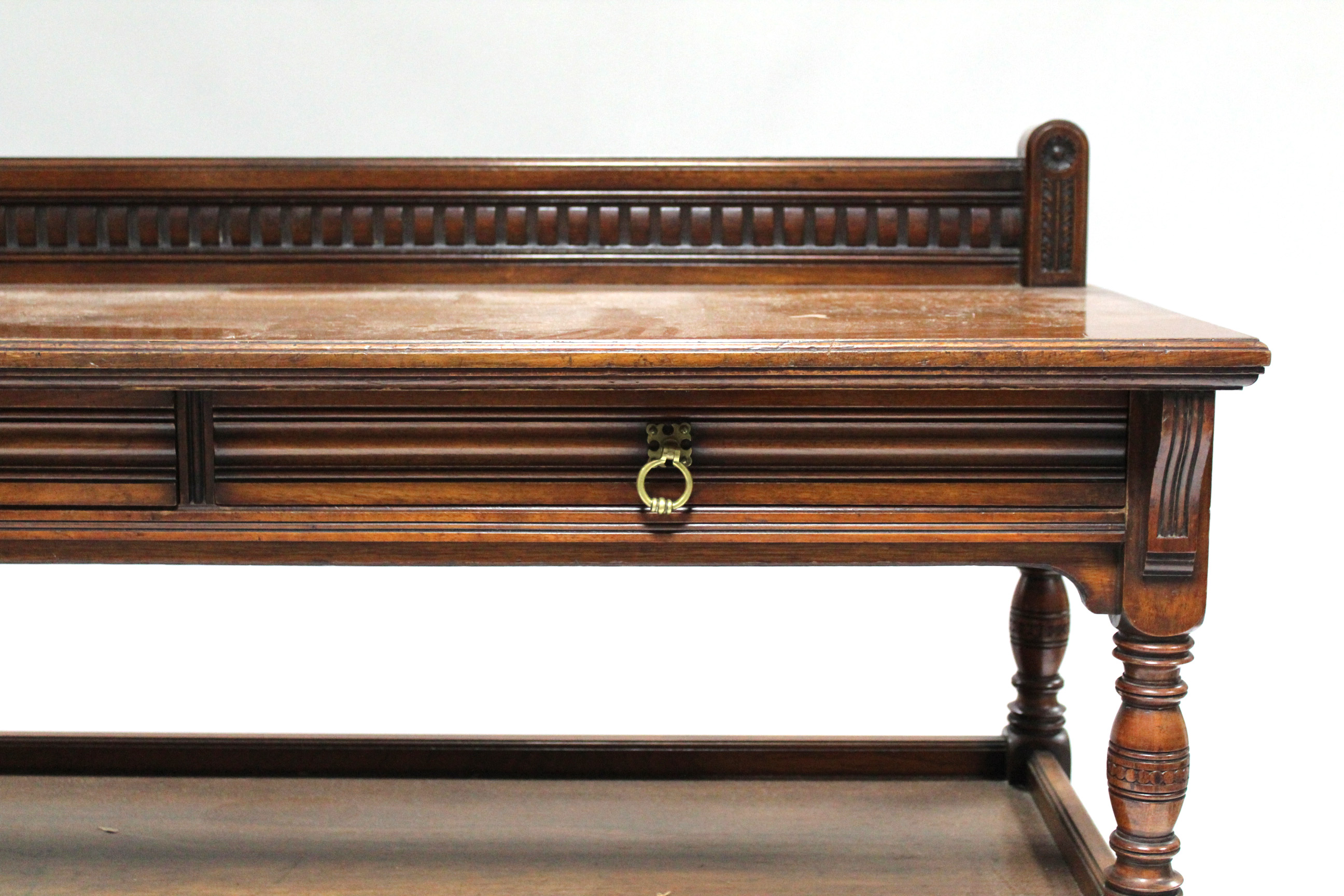 A late Victorian carved mahogany two-tier dumb waiter by Gillow & Co., fitted two frieze drawers - Image 7 of 7