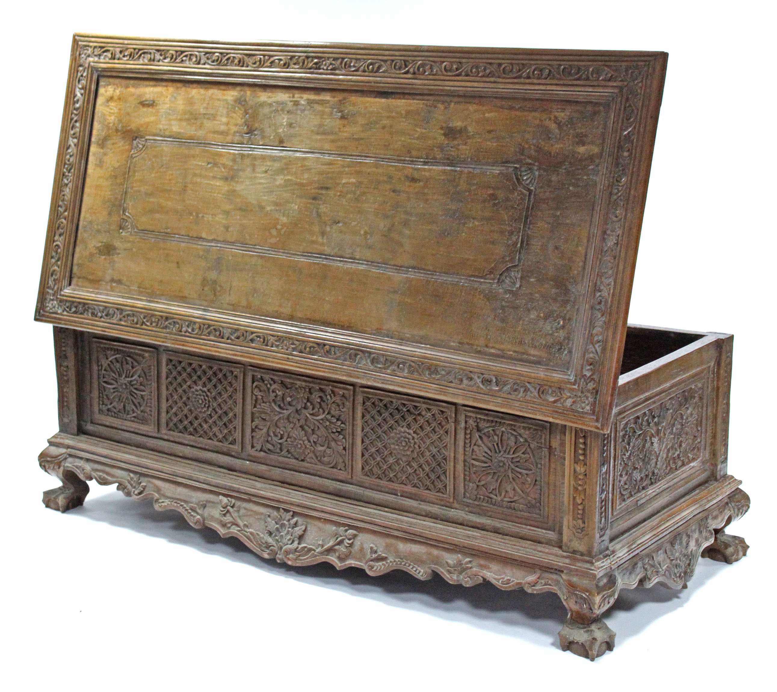 A 19th century INDONESIAN SOLID HARDWOOD CHEST, profusely carved to all sides with floral & - Image 9 of 11