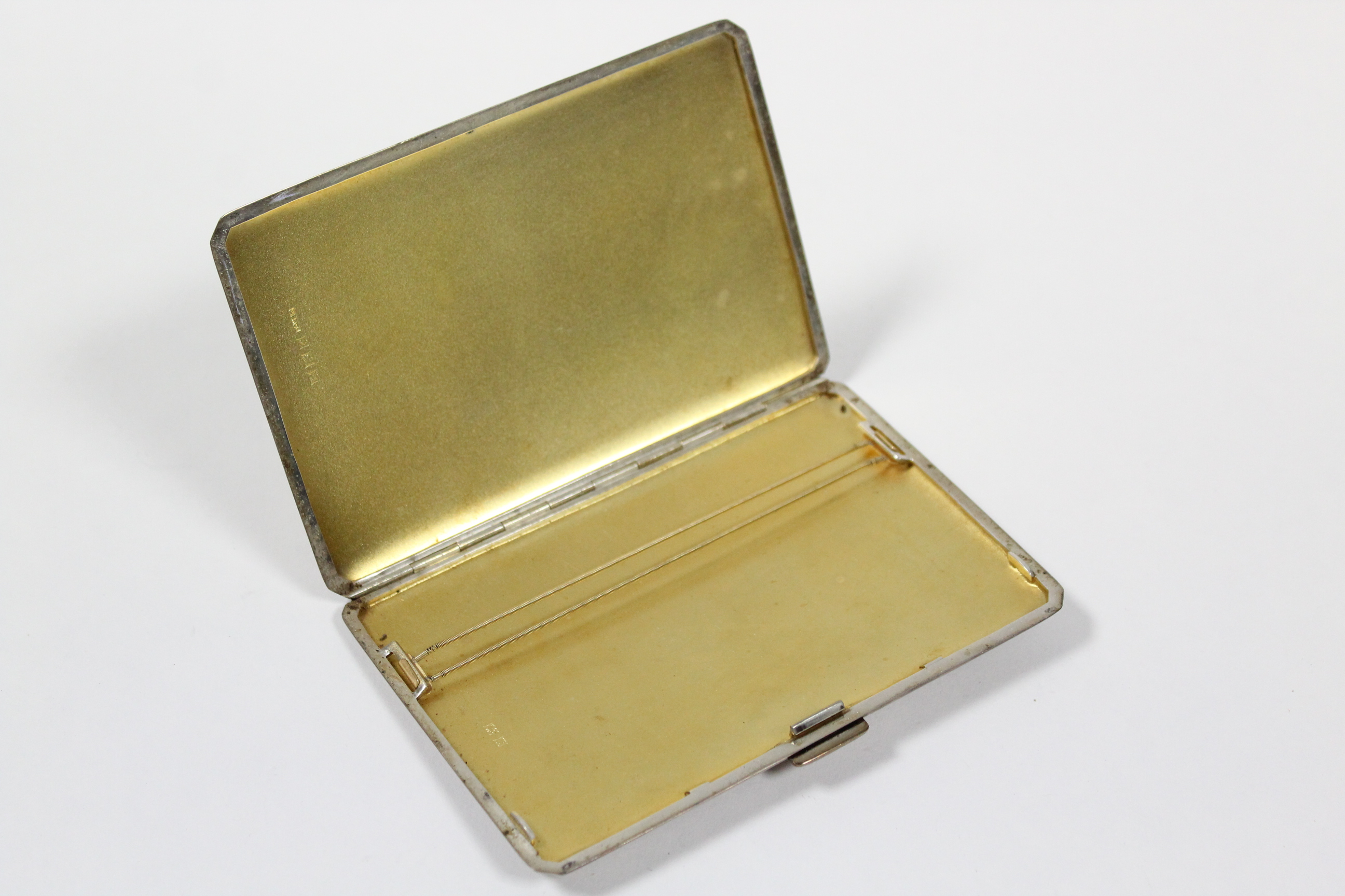 A silver rectangular engine-turned pocket cigarette case, 5” x 3¼2; Birmingham 1950, by D. Bros. ( - Image 2 of 2