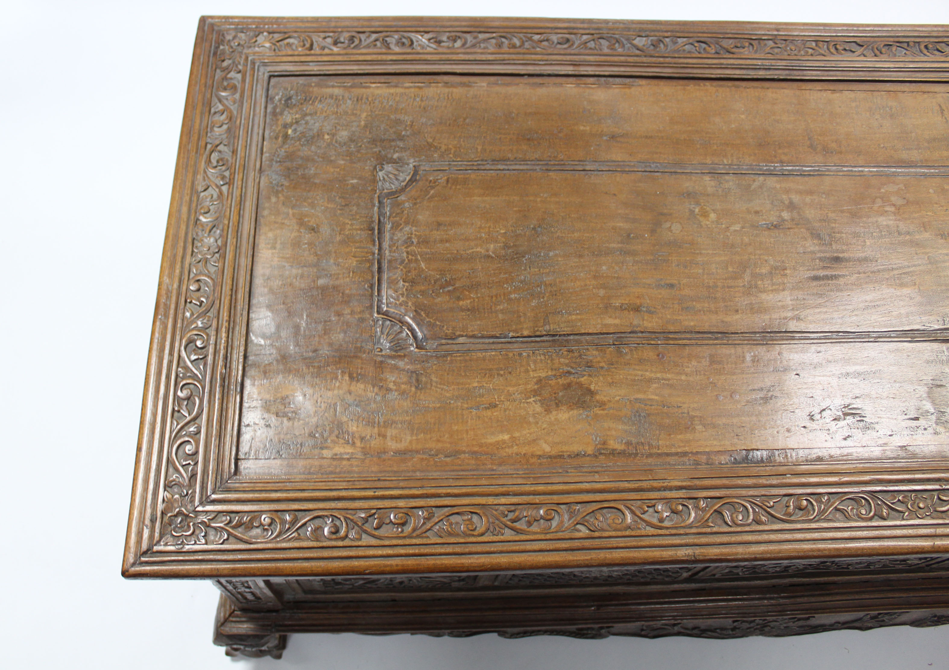 A 19th century INDONESIAN SOLID HARDWOOD CHEST, profusely carved to all sides with floral & - Image 10 of 11