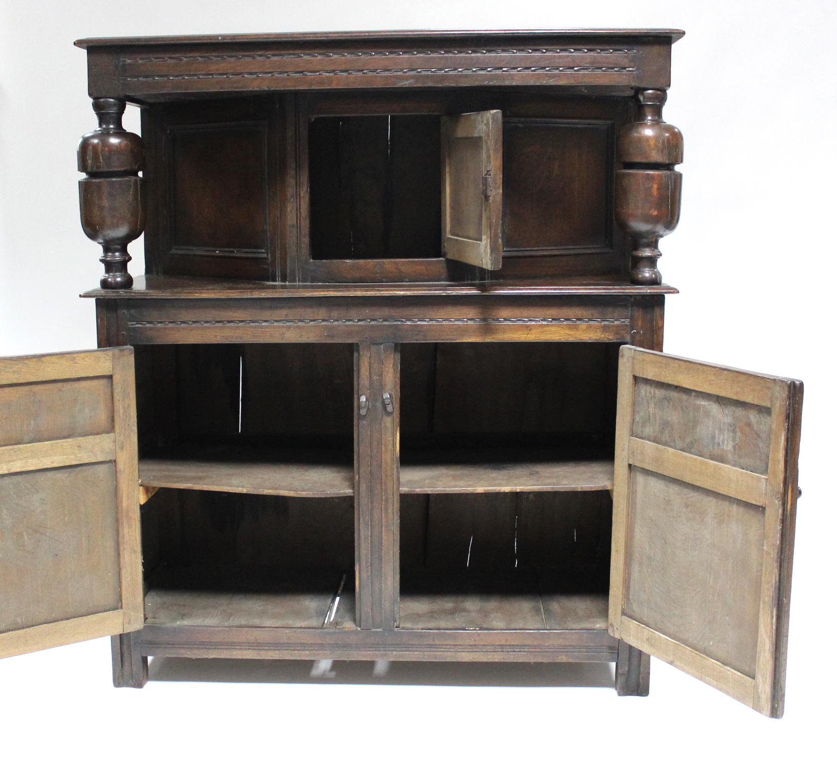 A 17th century-style joined oak court cupboard, the upper part with craved frieze & central panel - Image 3 of 8