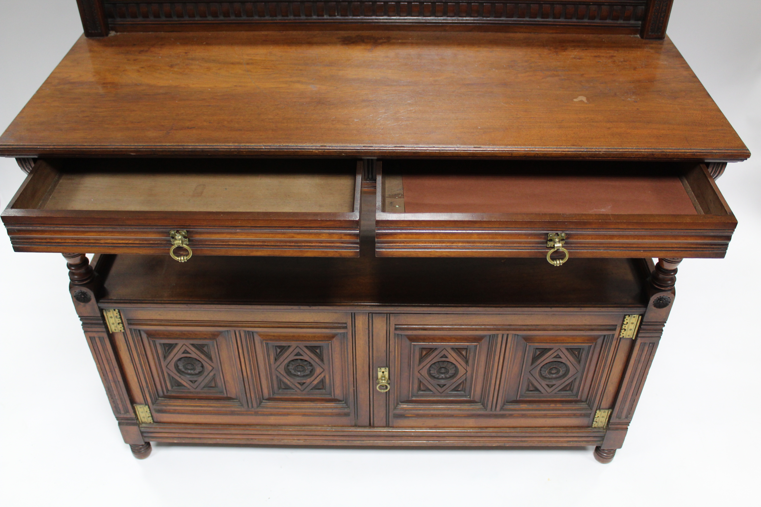 A late Victorian carved mahogany two-tier dumb waiter by Gillow & Co., fitted two frieze drawers - Image 4 of 7