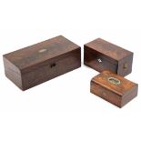 An early 19th century figured mahogany writing slope, 19¾” wide; a ditto tea caddy with lion-