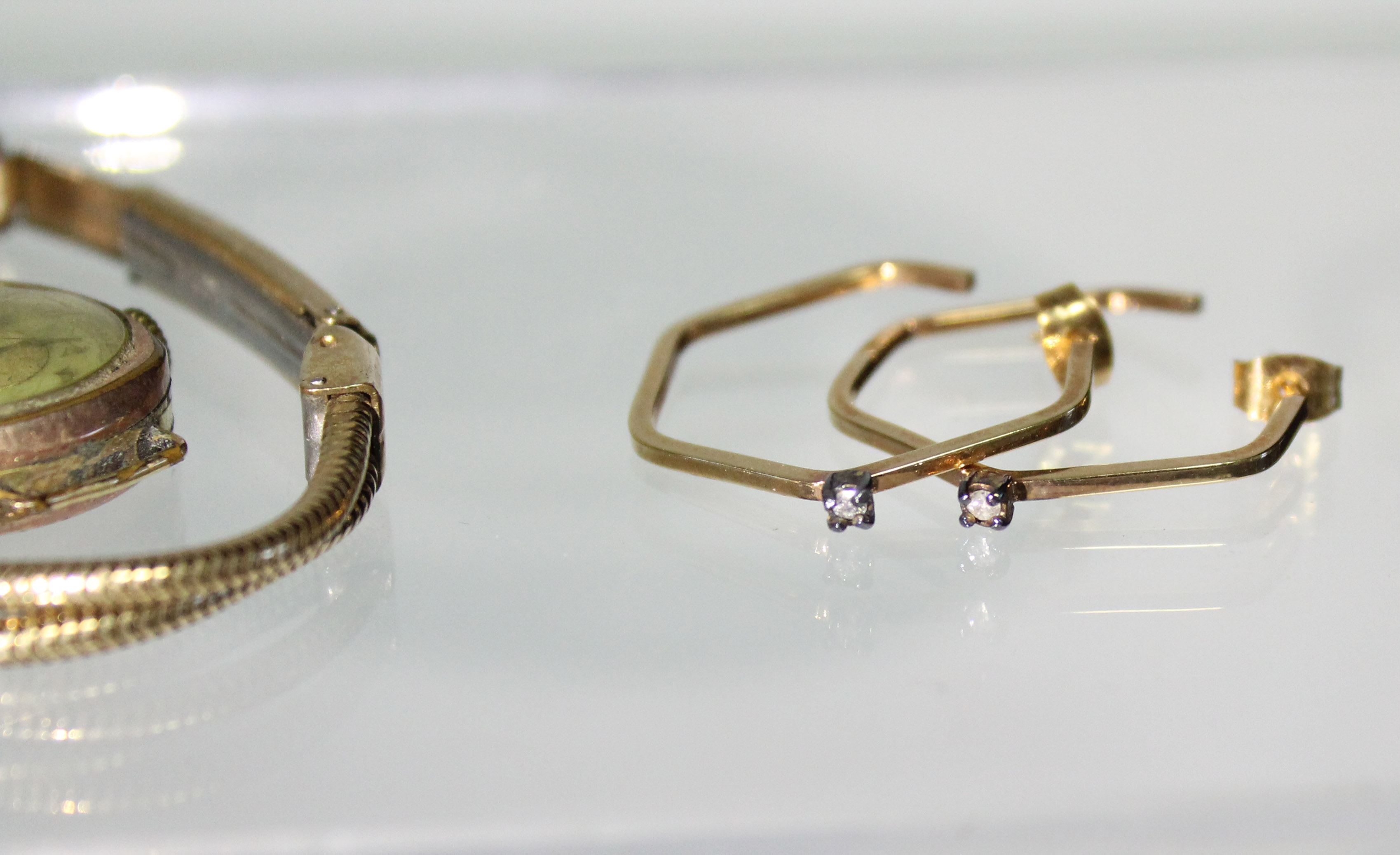 A pair of 14K pentagonal hoop earrings, each set tiny diamond (2.2gm gross); a ladies’ wristwatch in - Image 2 of 4