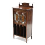 A Victorian inlaid-rosewood music cabinet, fitted two adjustable shelves enclosed by mirrored