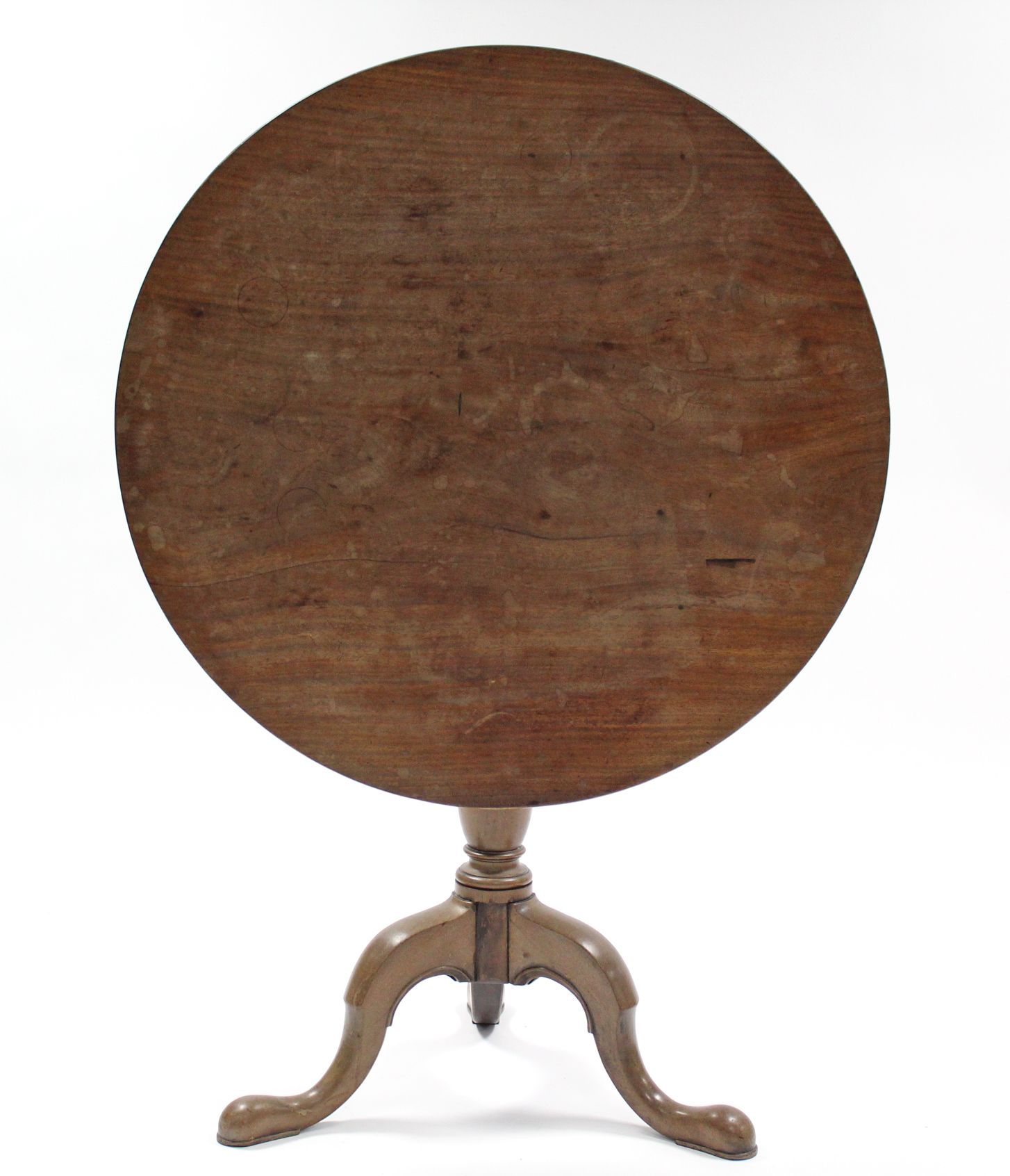 A late 18th century mahogany tripod table, the circular tilt-top on baluster turned centre