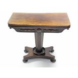 An early Victorian rosewood card table, the rectangular fold-over top with rounded corners, the