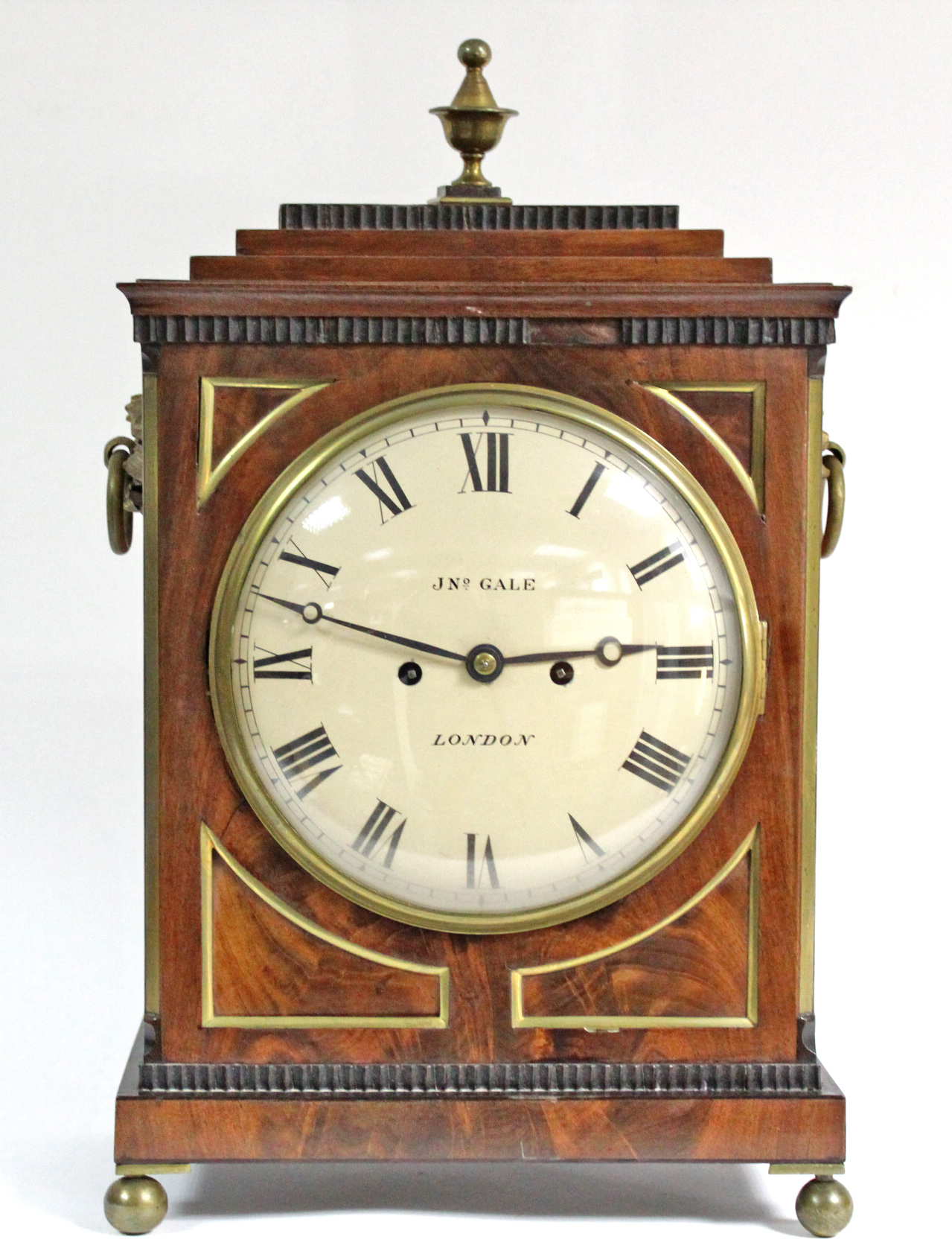 A REGENCY BRACKET CLOCK by JONATHAN GALE, LONDON, with roman numerals to the 8” diam. white