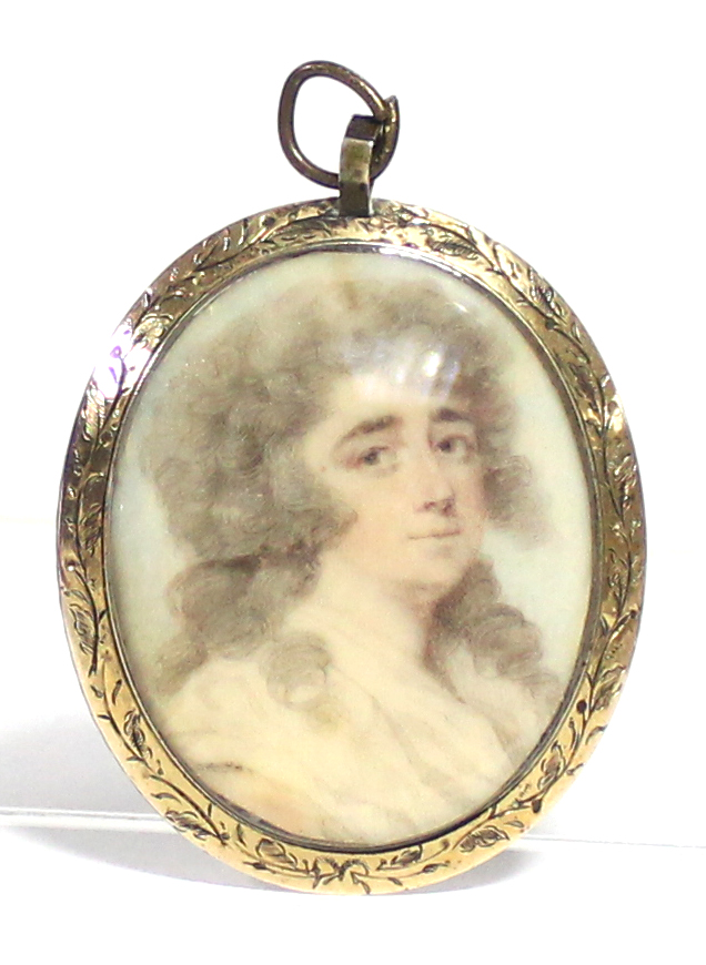 A late 18th century portrait miniature of a young woman with long curled hair; on ivory, 1½” x