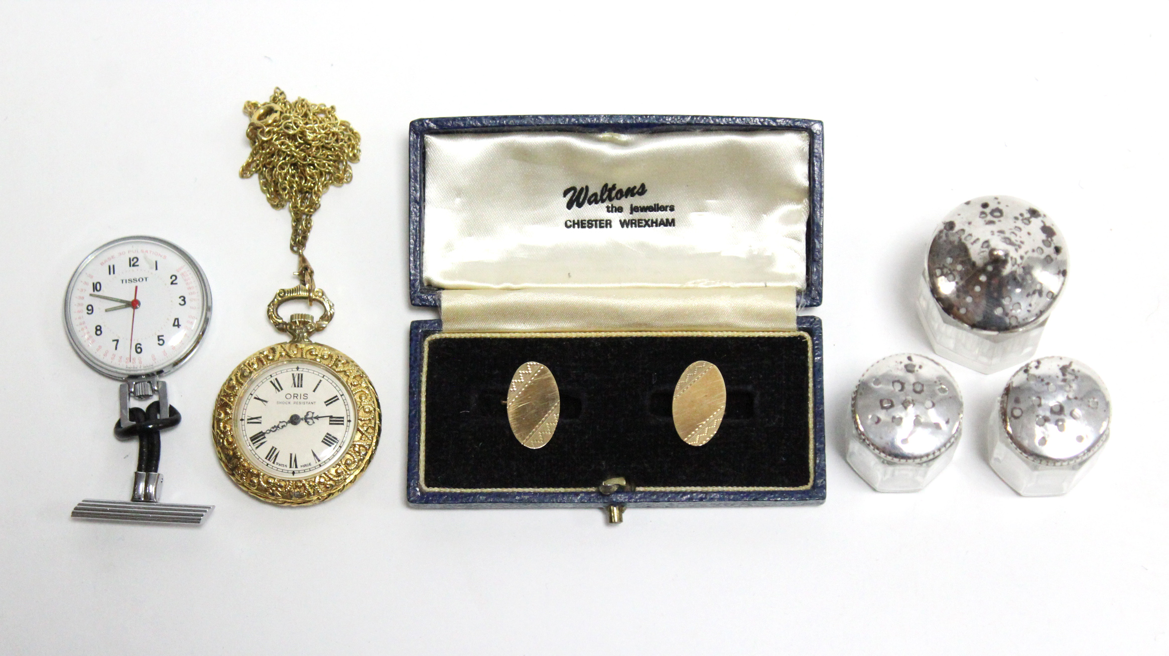 A pair of 9ct gold cufflinks; two fob watches; & three glass condiments each with silver top.