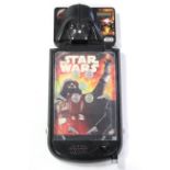 A Kodak folding camera with leather case; an artist’s portable easel; a “star wars” pinball toy;