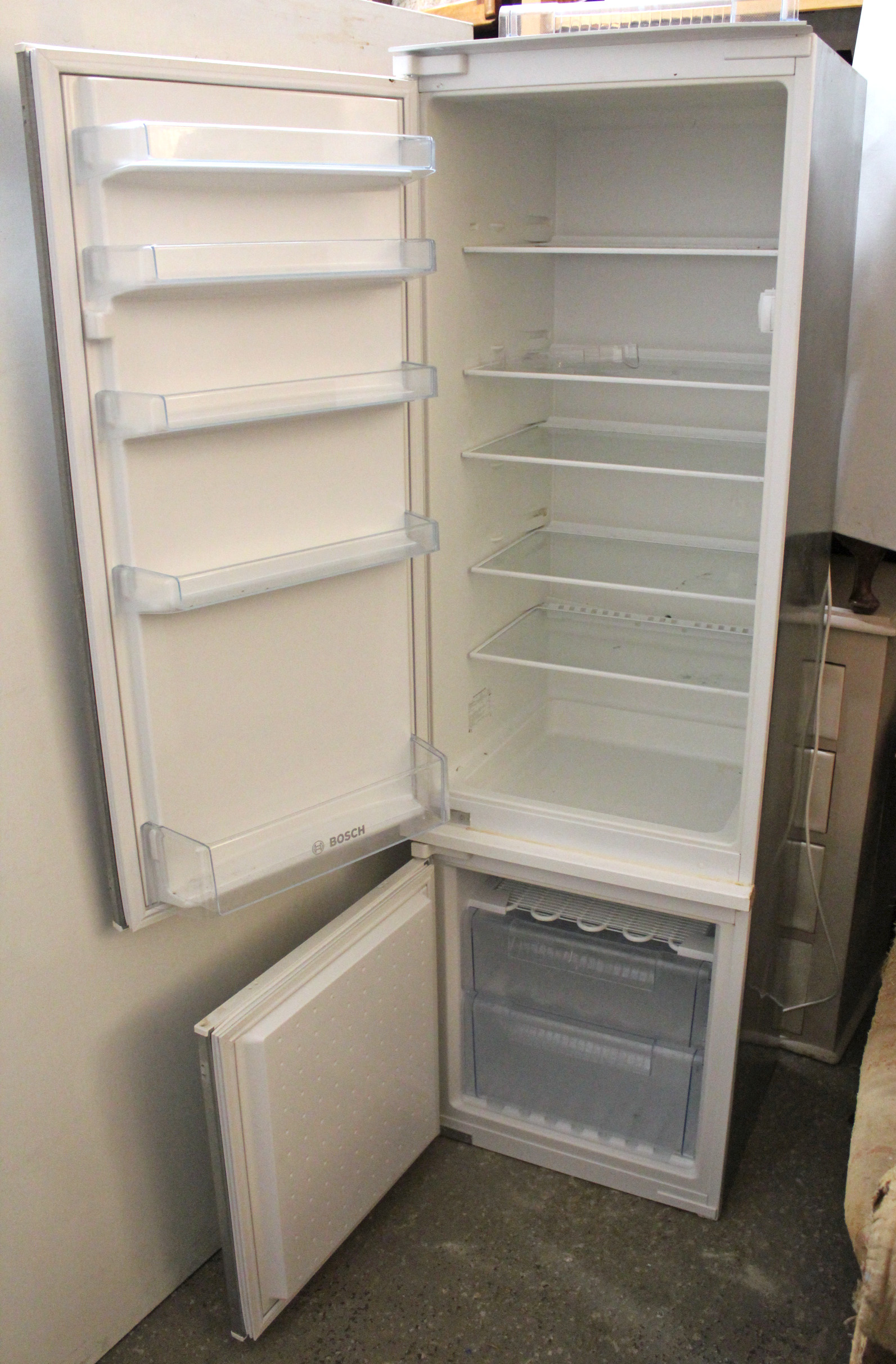 A Bosch integrated fridge-freezer in stainless steel case, 21” wide x 70” high, w.o. - Image 2 of 2