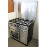 A Rangemaster “Professional” cooking range, in stainless-steel & black finish case, 35½” wide,