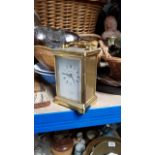 A brass cased carriage clock; a lacquer work oval tray; two decorative pictures; & sundry other