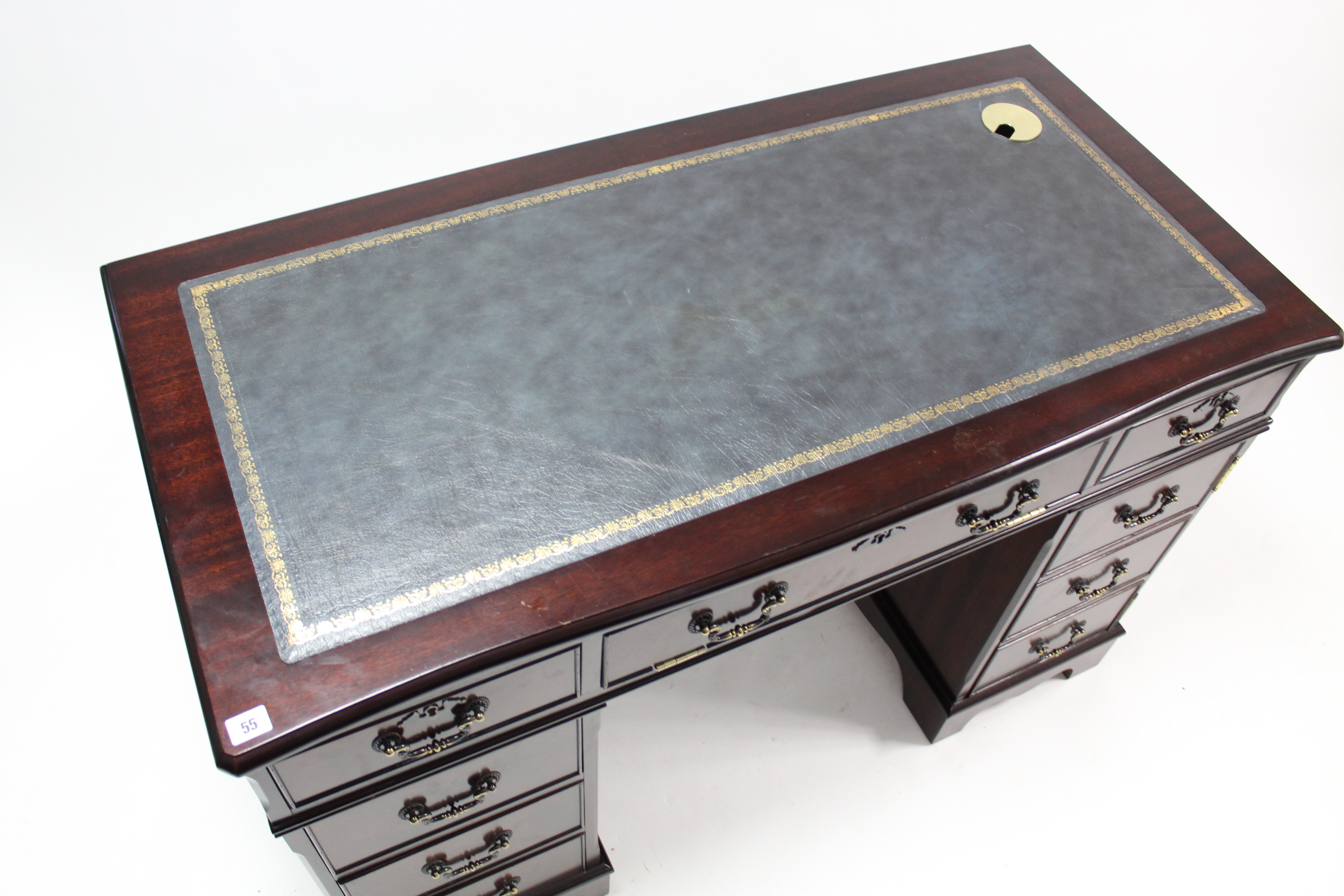 A reproduction mahogany break-front pedestal desk, inset gilt-tooled green leather, fitted with an - Image 3 of 4