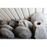 Four cast-stone staddle stones (various sizes); & a staddle stone top, part w.a.f.