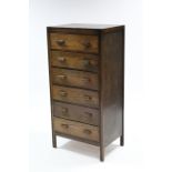 A mid-20th century oak upright chest, fitted six long drawers with block handles, 23¾” wide x 48¼”