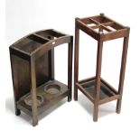 A 1930’s oak four-division umbrella stand, 29” high; & an oak two-division ditto, 25” high.