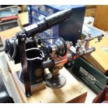 A Singer watchmakers lathe (No. 99k); & various other watchmakers tools; & accessories.