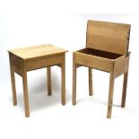 A pair of beech school desks each enclosed by hinged lift-lid, & on square supports, 24” wide.