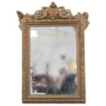 A large gilt frame rectangular wall mirror with griffin surmount & beaded edge, 47½” x 34½” (