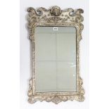 A continental-style rectangular wall mirror in silvered-finish frame, 29” x 17”; & an oval wall