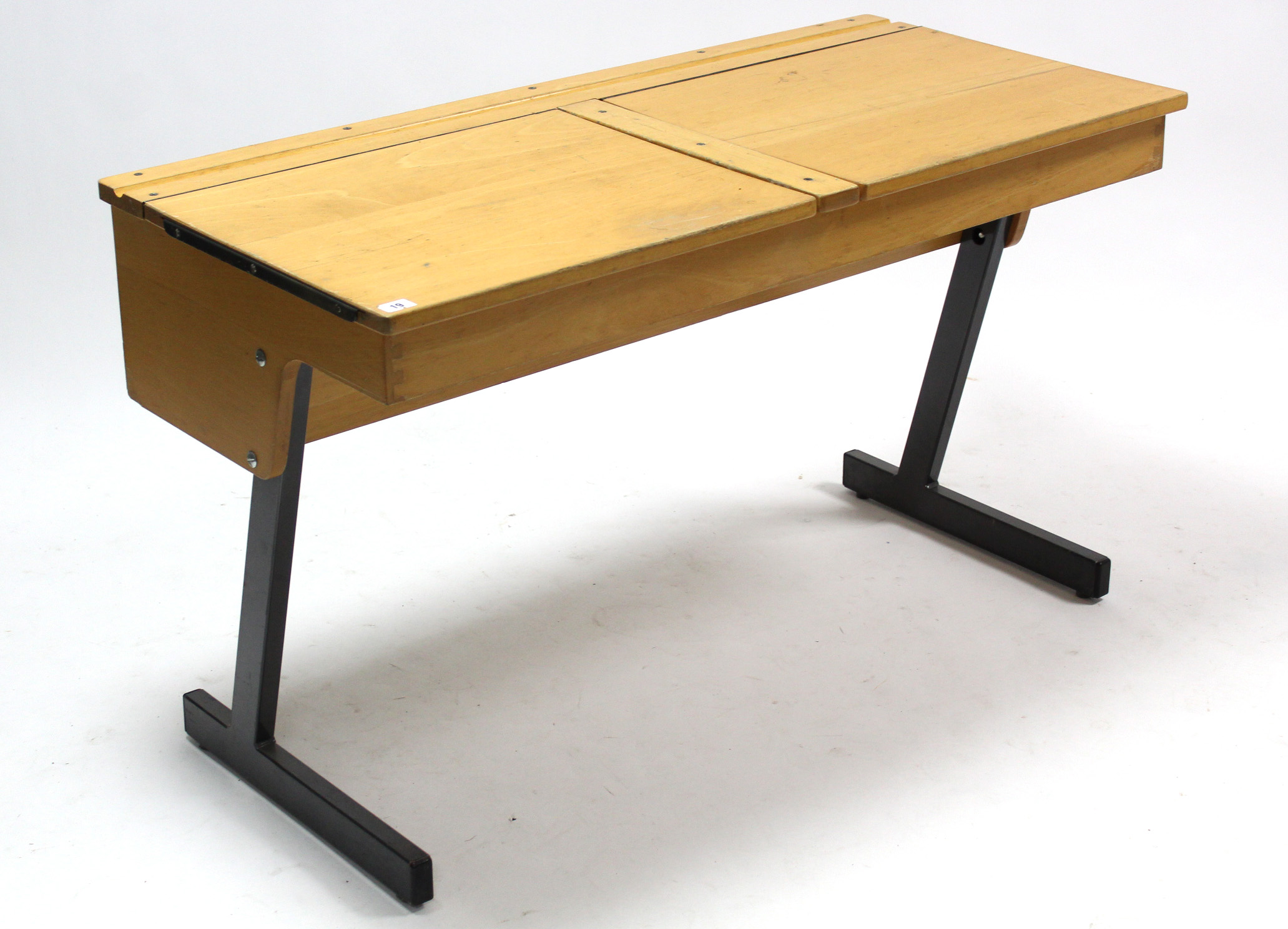 A beech “duet” school desk on black metal-finish supports, 44” wide.