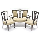 An Edwardian nine-piece salon suite comprising of a two seater settee, 50” long, a pair of