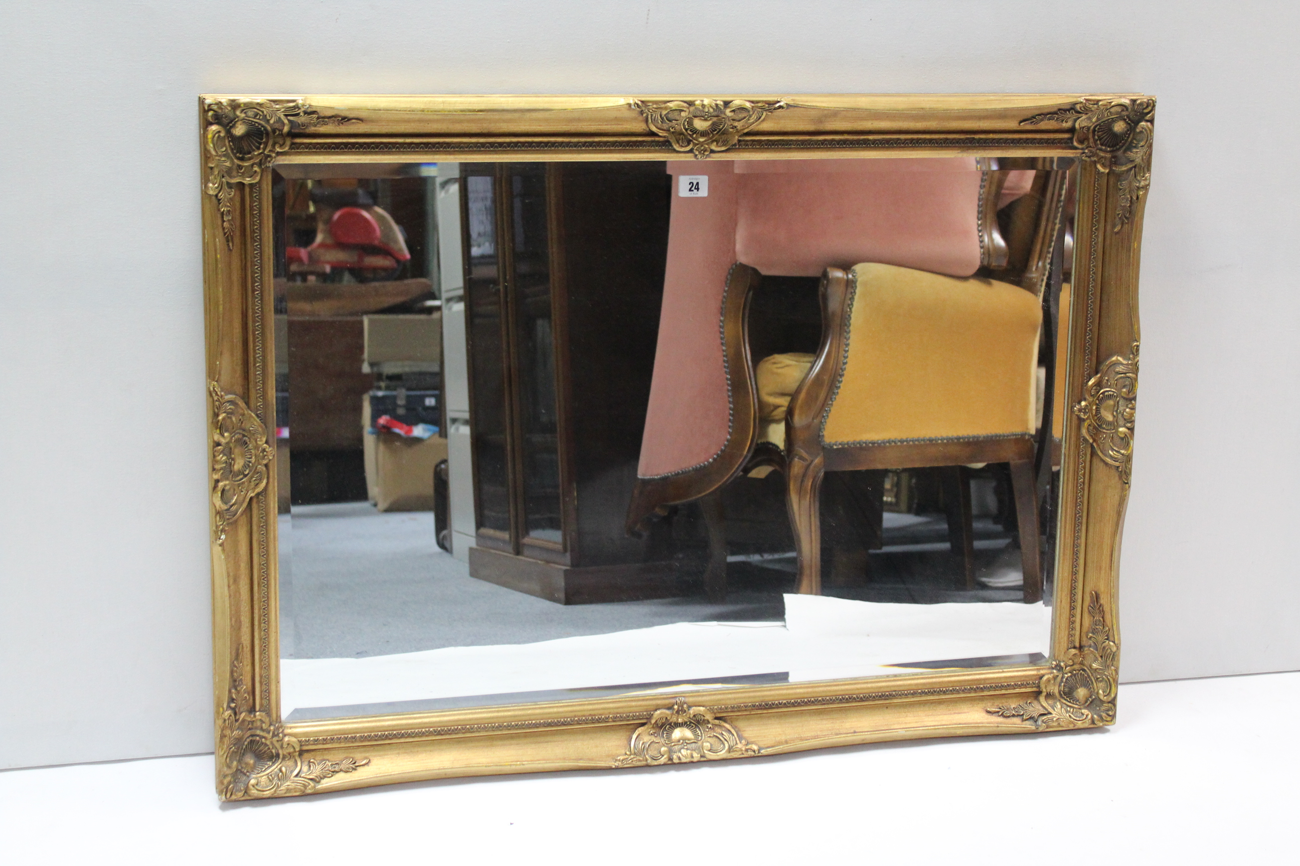 A large gilt frame rectangular wall mirror inset bevelled plate, 29” x 41”.