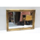 A large gilt frame rectangular wall mirror inset bevelled plate, 29” x 41”.