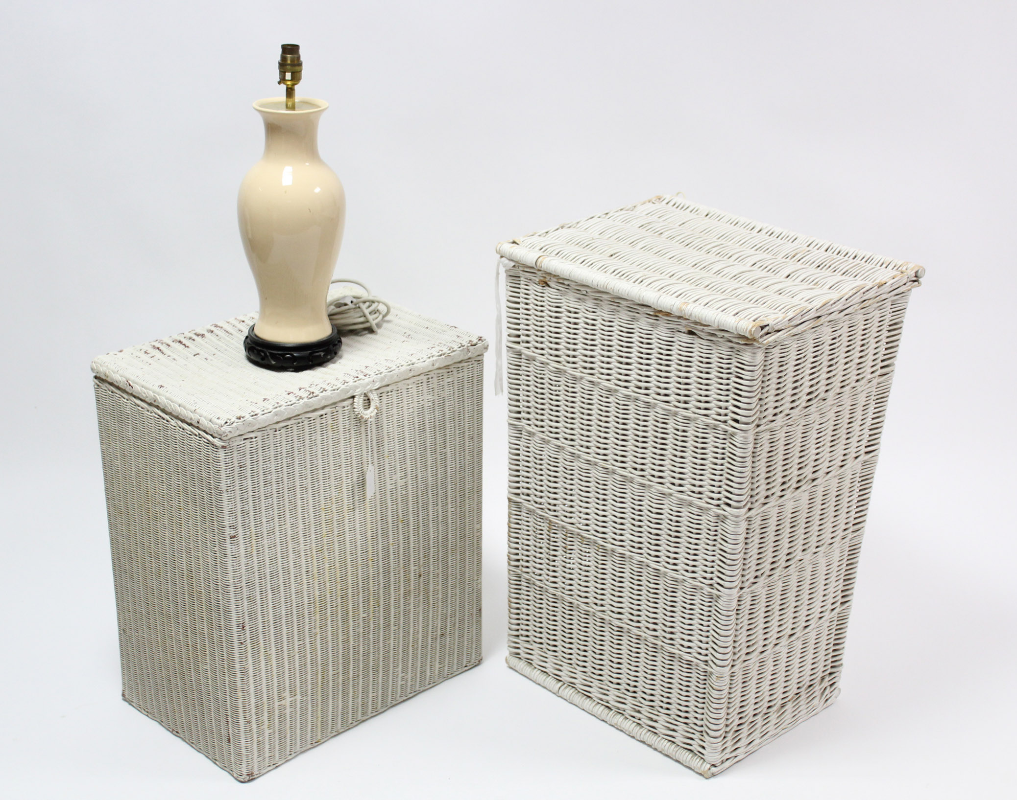 A Lusty’s Lloyd Loom white painted linen box; a similar ditto; & a ceramic table lamp.