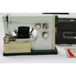 A Husqvarna “Practica II” electric sewing machine, with case, w.o.