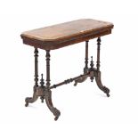 A 19th century inlaid-walnut card table inset crimson leather to the rectangular fold-over top, & on