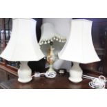 Nine various table lamps, each with shade.