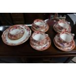 A Victorian china thirty-six piece part tea service with oriental village scene decoration.