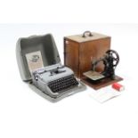 A Willcox & Gibbs “Automatic” silent sewing machine; & an Olympia portable typewriter, each with