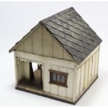 A painted wooden dolls model of a country Inn, 27” wide x 29½” high x 29” deep.