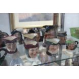 A Collection of seventeen Royal Doulton small character jugs, part w.a.f.