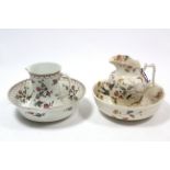 Two floral decorated toilet jugs & bowls, w.a.f.