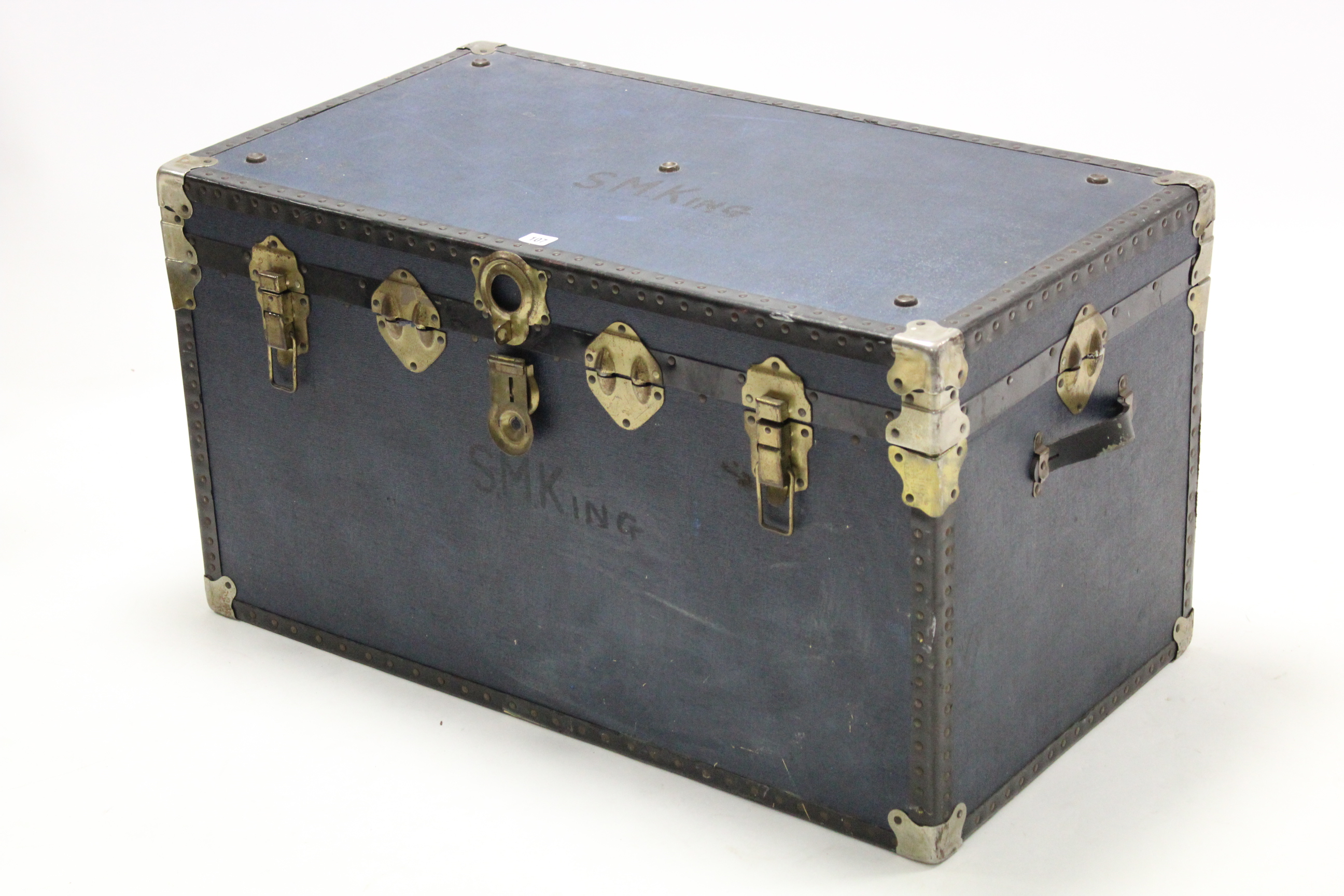 A blue fibre-covered travelling trunk with hinged lift-lid, 36” wide; a gilt frame rectangular