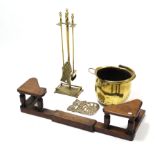 A brass jardinière; a brass fire-companion; a brass novelty “cat” trivet; & an oak adjustable fire