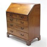 A 19th century inlaid-mahogany bureau, with fitted interior enclosed by fall-front above four long