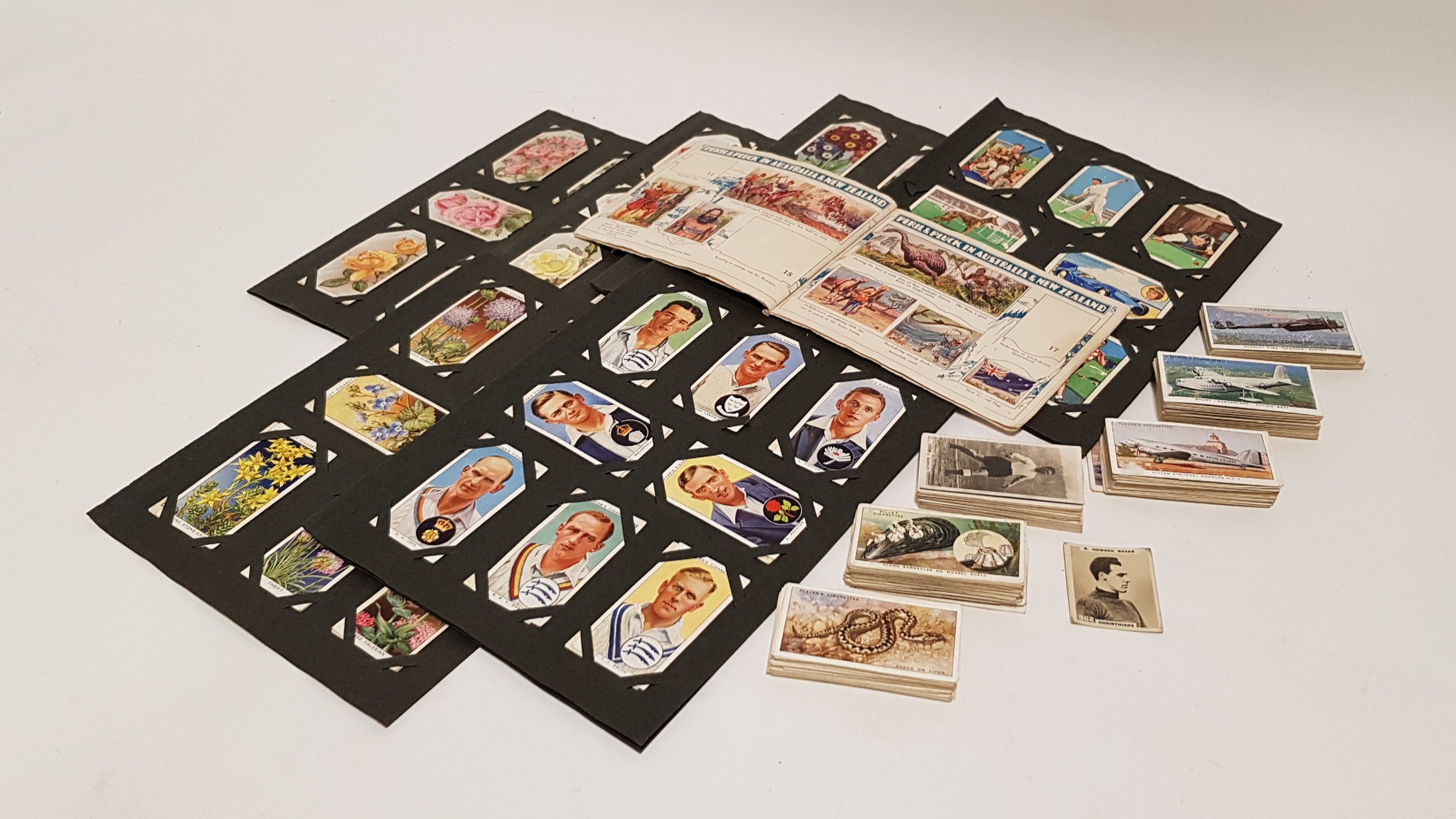 Approximately five hundred various cigarette cards & trade stickers, circa 1920’s/1930’s.