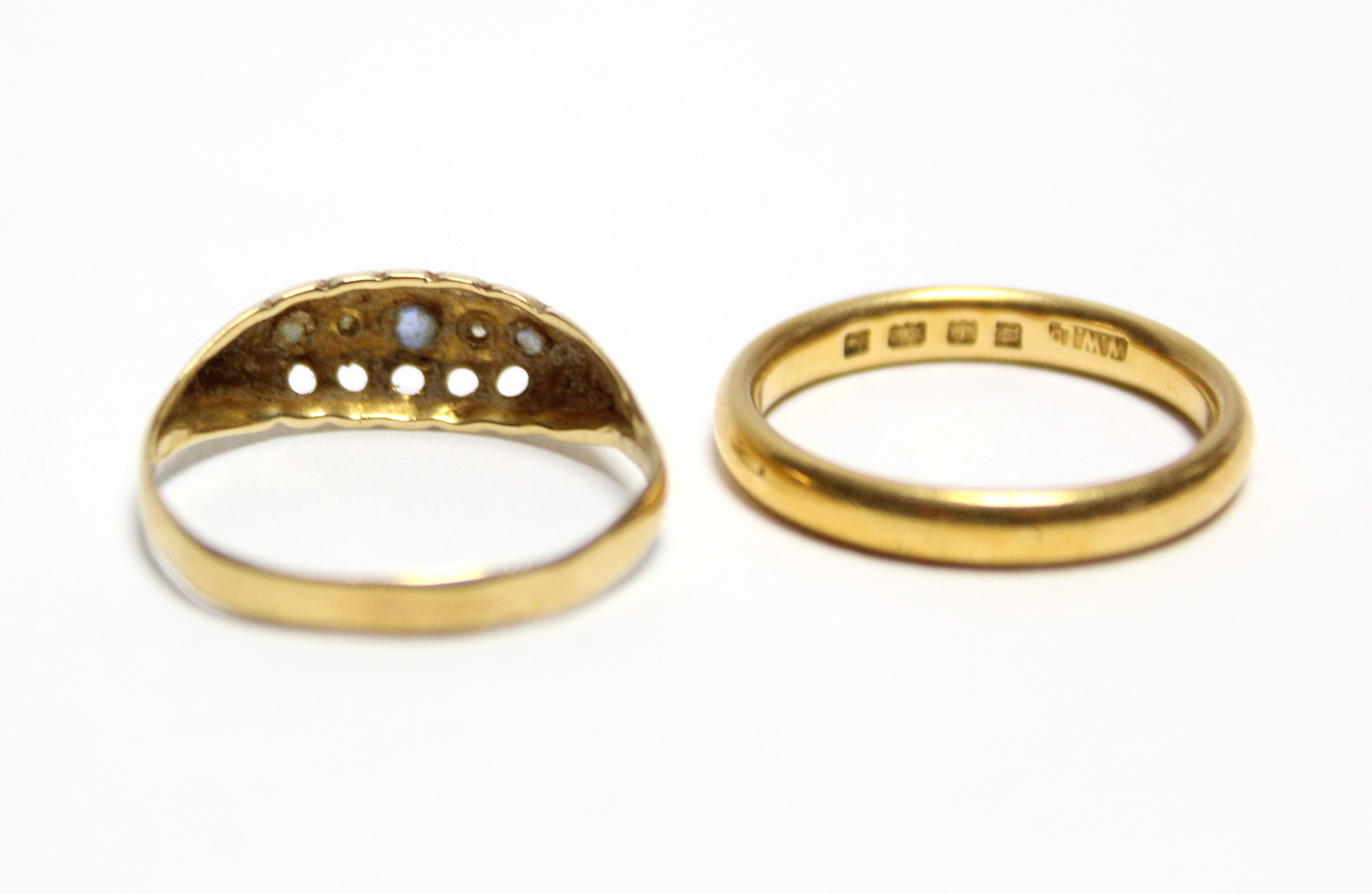 A 22ct gold wedding band; & an 18ct gold ring inset five precious stones - Image 3 of 4