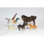 A Beswick model of a Duck (No. 749); a Beswick model dog; & two Beswick model horses.