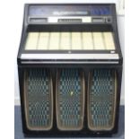 A 1970’s ROCK-OLA JUKE BOX (Model No. 477), 33½” wide x 45½” high; together with various
