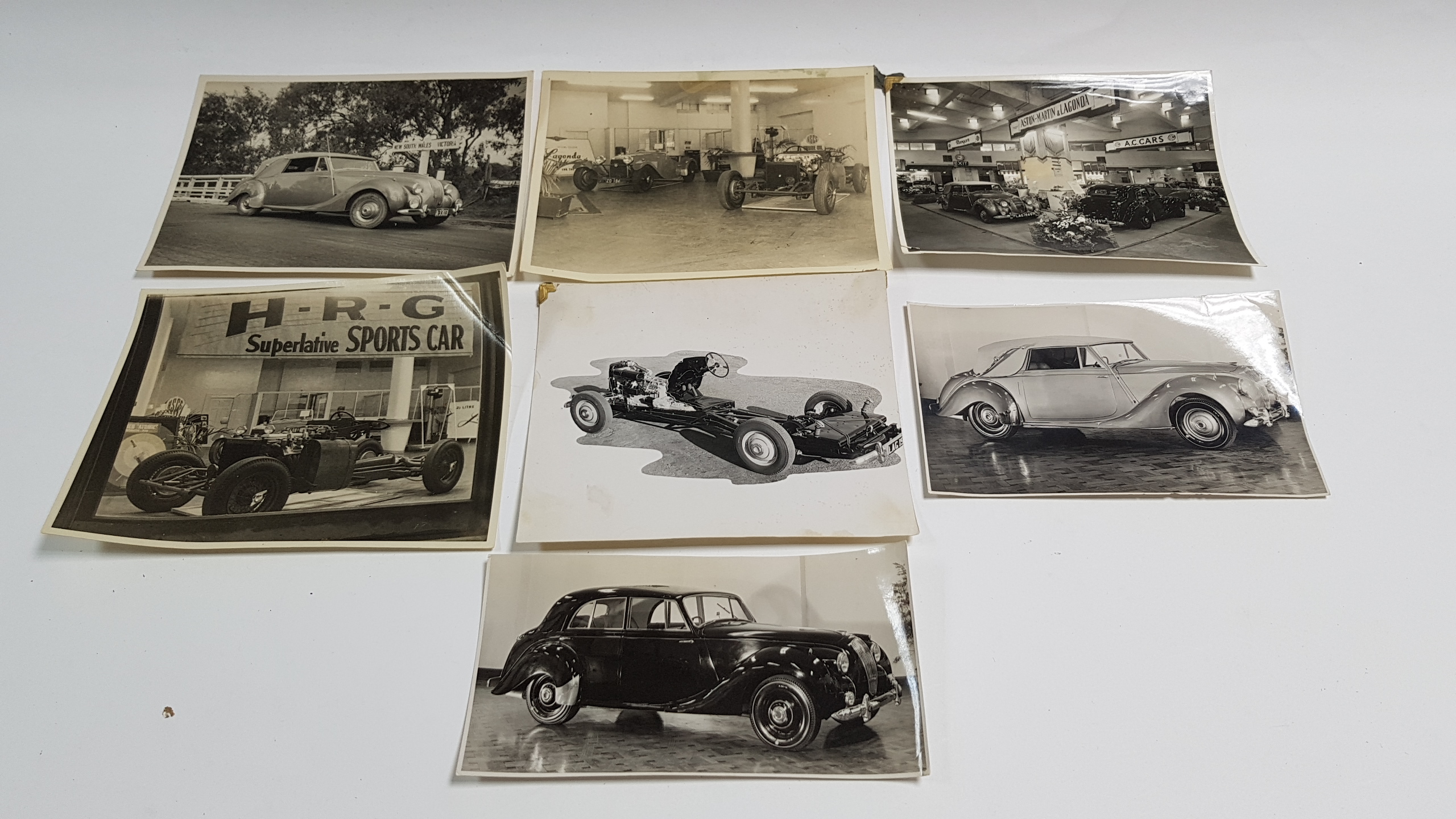 Thirteen mid-20th century photographs of motor cars, loose; an early 20th century autograph album; & - Image 2 of 5