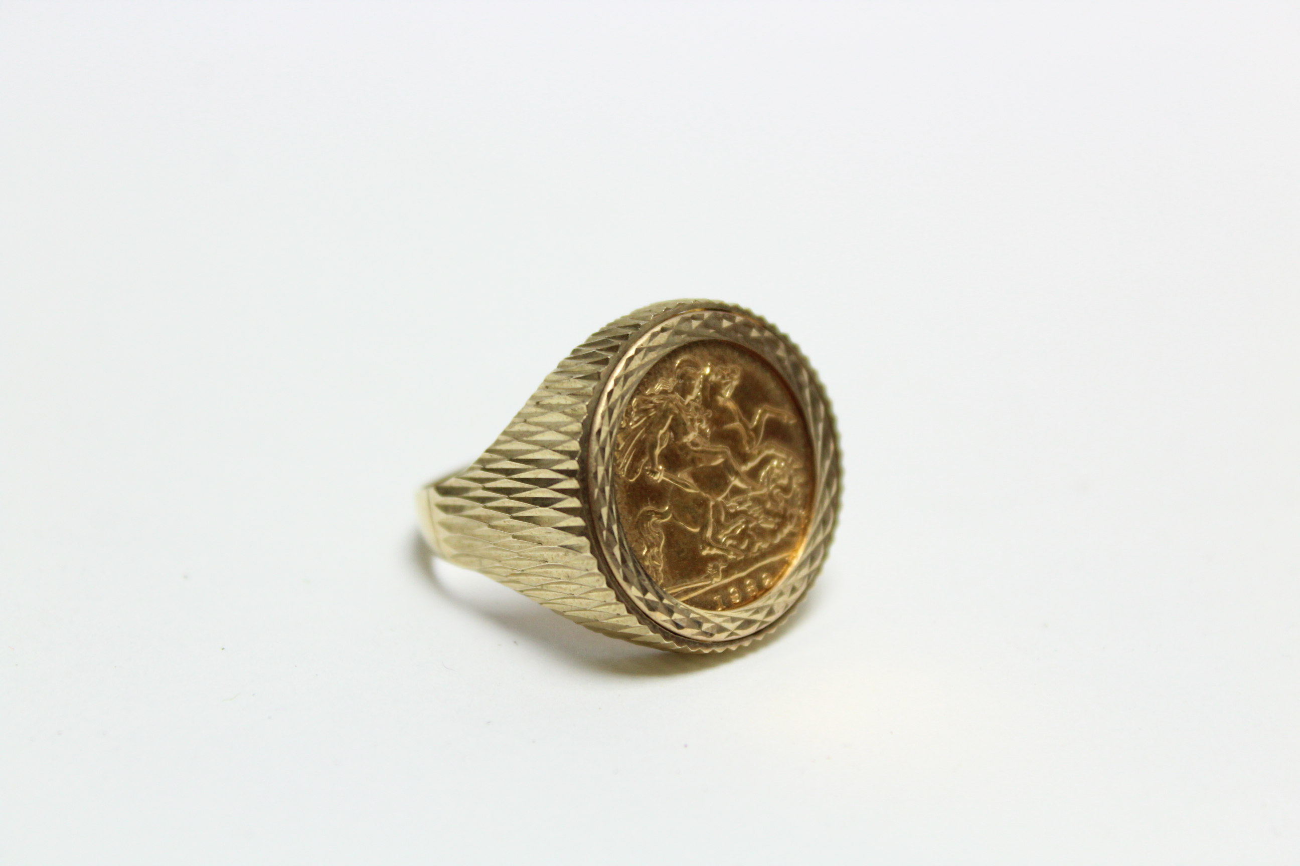 A 9ct. gold gent's ring inset 1982 half-sovereign. - Image 2 of 4