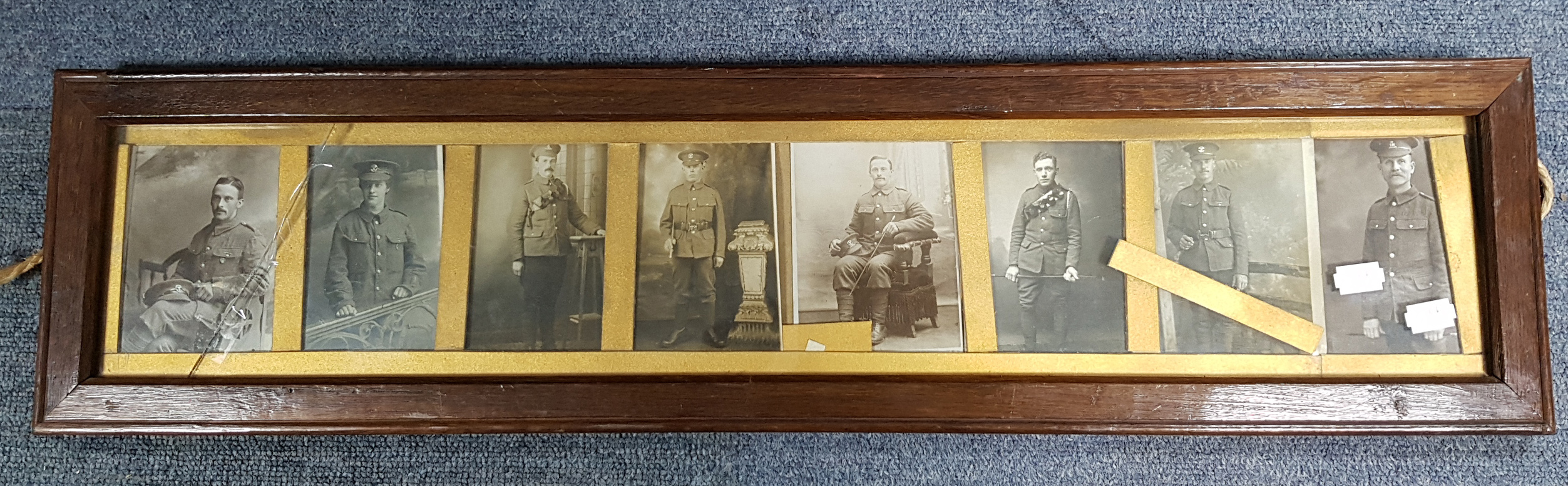 Eight photographic postcards – all depicting British WWI officers & displayed in a glazed oak