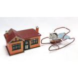 A painted wooden one storey doll’s house with open back, 27” wide x 17” high; various items of